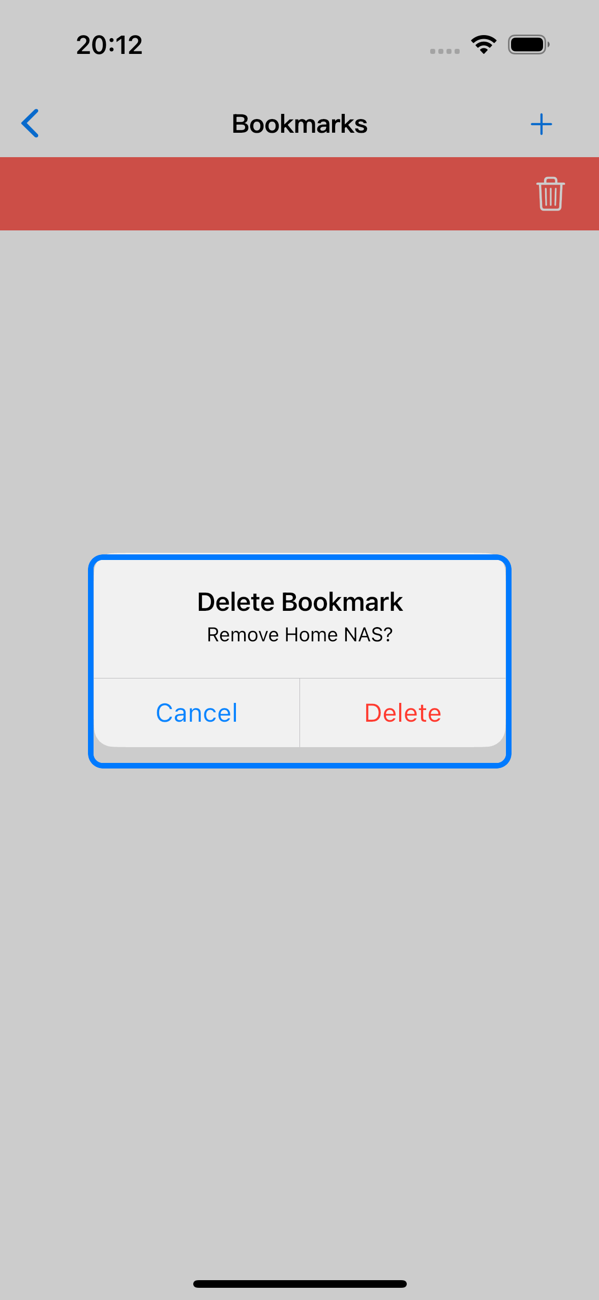 The delete confirmation appears after swiping left on a saved bookmark.
